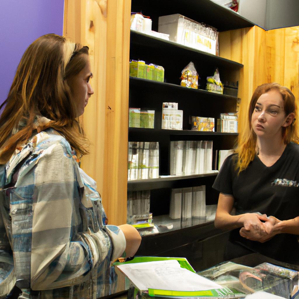 A friendly staff member at Cloud 9 Dispensary Muskegon provides personalized guidance to customers in selecting their preferred cannabis products.